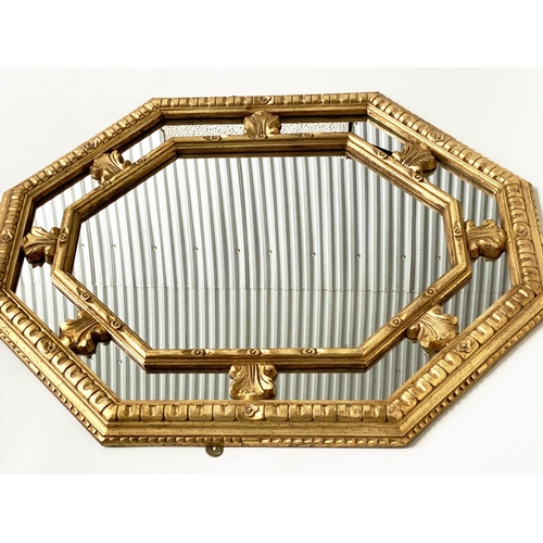 89 - WALL MIRROR, Italian style octagonal foliate gilded with marginal mirror plates, 94cm H x 77cm.