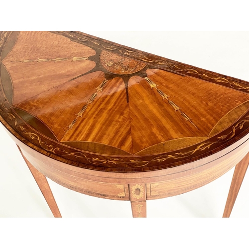 493 - CARD TABLE, late 19th/early 20th century demilune foldover satinwood radial veneered and marquetry i... 