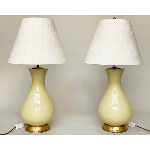 496 - LOUISA TABLE LAMPS, a pair, 78cm H, by Heathfield and Co., lemon yellow ceramic, vase form with gild... 