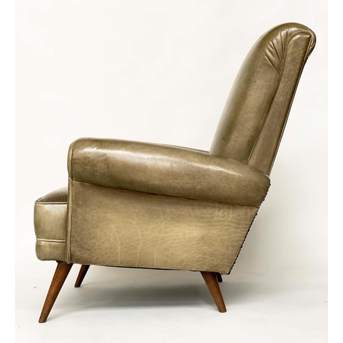 636 - HOWARD KEITH STYLE ARMCHAIR, 1970's leather with scroll back and arms and well splayed teak supports... 