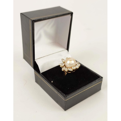 19 - AN ASPREY 18CT GOLD DIAMOND AND PEARL SET DRESS RING, the central pearl of 10mm diameter, surrounded... 