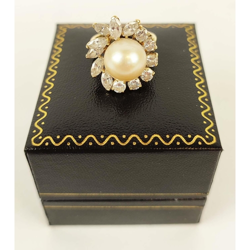 19 - AN ASPREY 18CT GOLD DIAMOND AND PEARL SET DRESS RING, the central pearl of 10mm diameter, surrounded... 