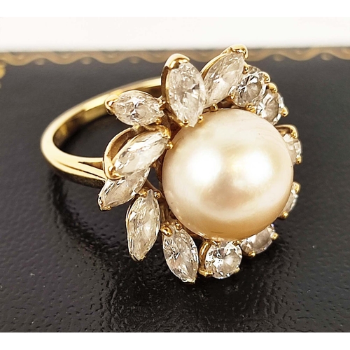 19 - AN ASPREY 18CT GOLD DIAMOND AND PEARL SET DRESS RING, the central pearl of 10mm diameter, surrounded... 