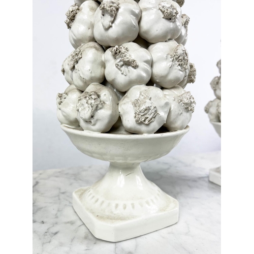 2 - GARLIC OBELISKS, a pair, blanc de chine, 43cm H. (2)