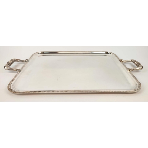 29 - A CHRISTOFLE SILVER PLATED TWIN HANDLED SERVING TRAY, leaf motif border, 62cm x 39cm.