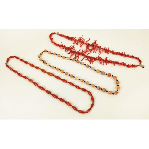 42 - A RED CORAL DOUBLE STRAND NECKLACE, 36cm long, a carnelian single strand bead necklace, 64cm long, p... 