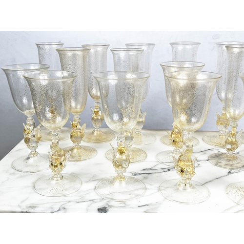 48 - A SALVIATA VENETIAN SWAN STEM GLASSWARE SET, hand blown, comprising eight wine glasses and eleven Ch... 