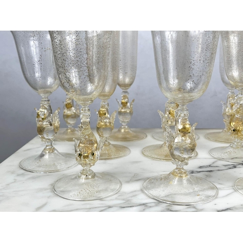 48 - A SALVIATA VENETIAN SWAN STEM GLASSWARE SET, hand blown, comprising eight wine glasses and eleven Ch... 