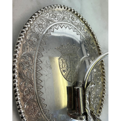 52 - DUTCH SILVER WALL SCONES, a pair, single arm with swag detail having an oval back plate, with engrav... 