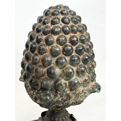 55 - BRONZE PINEAPPLE GARDEN FINIALS, a pair, in a verdigris finish, 60cm H. (2)