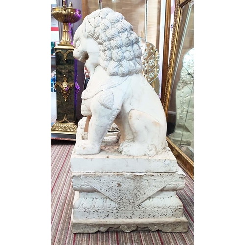 56 - MARBLE GARDEN FOO LIONS, a pair, early 20th century on plinths, 102cm H x 58cm D x 45cm W. (2)