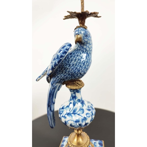 597 - CANDELABRA, a pair, in the form of parrots, blue and white ceramic, gilt mounts, 48.5cm H. (2)