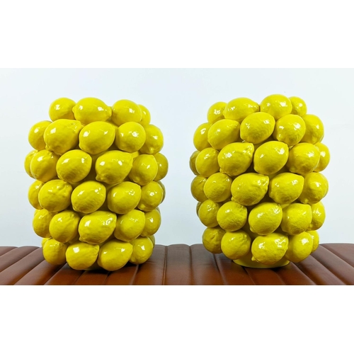 613 - VASES, a pair, glazed yellow ceramic, with lemon detail, 30cm H approx. (2)