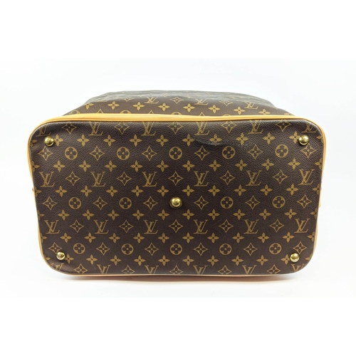 62 - LOUIS VUITTON CRUISER 45 TRAVEL BAG, monogram canvas and leather trims, name tag, ardillon buckle cl... 