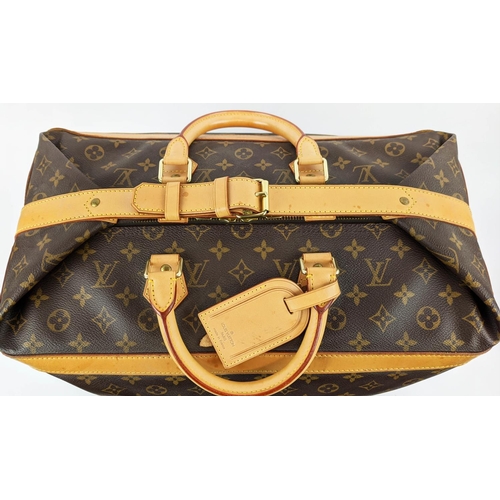 62 - LOUIS VUITTON CRUISER 45 TRAVEL BAG, monogram canvas and leather trims, name tag, ardillon buckle cl... 