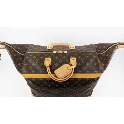 62 - LOUIS VUITTON CRUISER 45 TRAVEL BAG, monogram canvas and leather trims, name tag, ardillon buckle cl... 