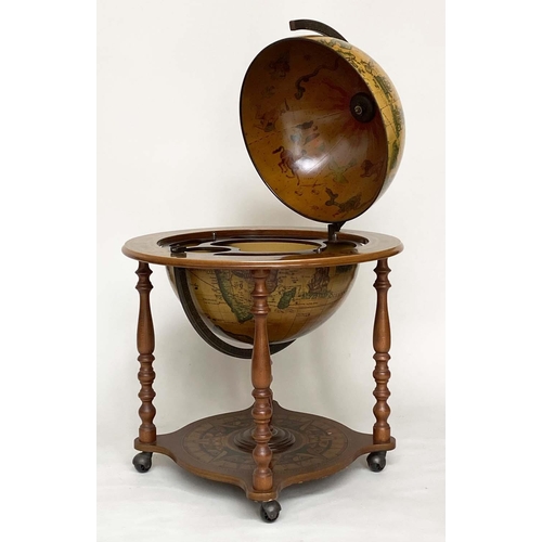 623 - GLOBE COCKTAIL CABINET, in the form of an antique terrestrial globe on stand with rising lid and fit... 