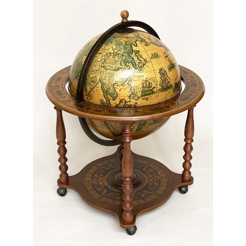 623 - GLOBE COCKTAIL CABINET, in the form of an antique terrestrial globe on stand with rising lid and fit... 