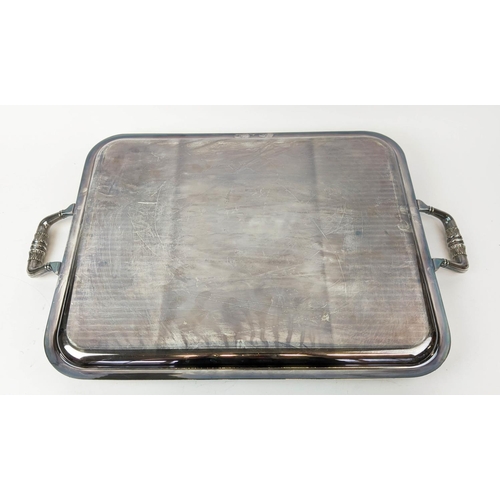 64 - TWO CHRISTOFLE SILVER PLATED TWIN HANDLED SERVING TRAYS, largest 60cm x 39cm, complete with cloth co... 