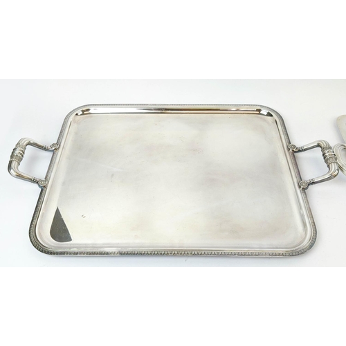 64 - TWO CHRISTOFLE SILVER PLATED TWIN HANDLED SERVING TRAYS, largest 60cm x 39cm, complete with cloth co... 