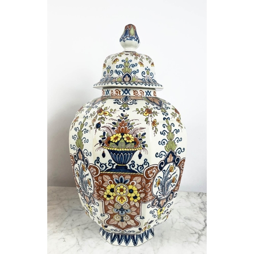 8 - LIDDED DELFT VASES, a pair, 19th century polychrome painted, faceted octagonal form, with foliate st... 