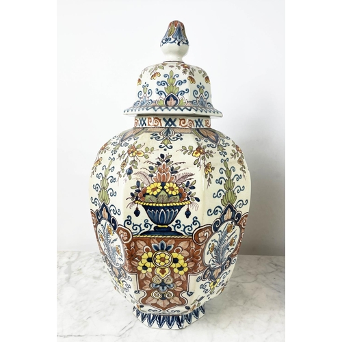 8 - LIDDED DELFT VASES, a pair, 19th century polychrome painted, faceted octagonal form, with foliate st... 