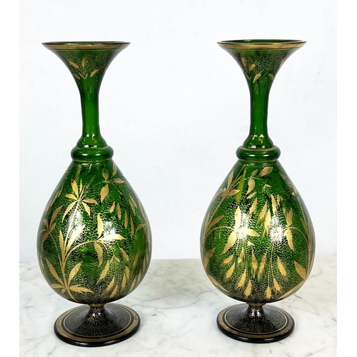 85 - LOETZ BOWLS, a pair, iridescent green glass and a pair of green with  gilt decoration bohemia vases,... 