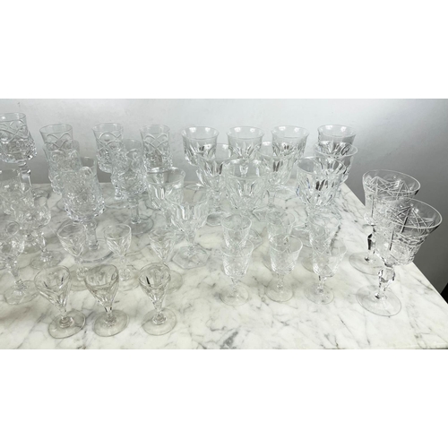 9 - A QUANTITY OF CUT GLASS, including six cut glass wine glasses, nine claret glasses, champagne flutes... 