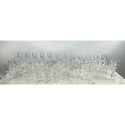 9 - A QUANTITY OF CUT GLASS, including six cut glass wine glasses, nine claret glasses, champagne flutes... 