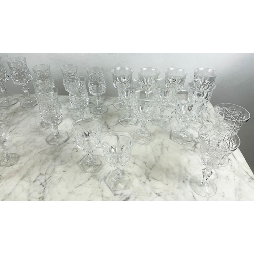 9 - A QUANTITY OF CUT GLASS, including six cut glass wine glasses, nine claret glasses, champagne flutes... 