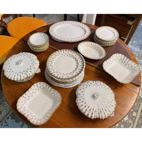 94 - SPODE 'FLEUR DE LYS GOLD' PART DINNER SERVICE, comprising ten plates, ten side plates, ten dessert b... 