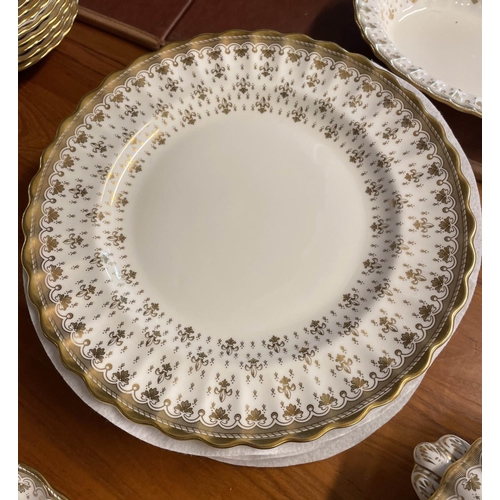 94 - SPODE 'FLEUR DE LYS GOLD' PART DINNER SERVICE, comprising ten plates, ten side plates, ten dessert b... 
