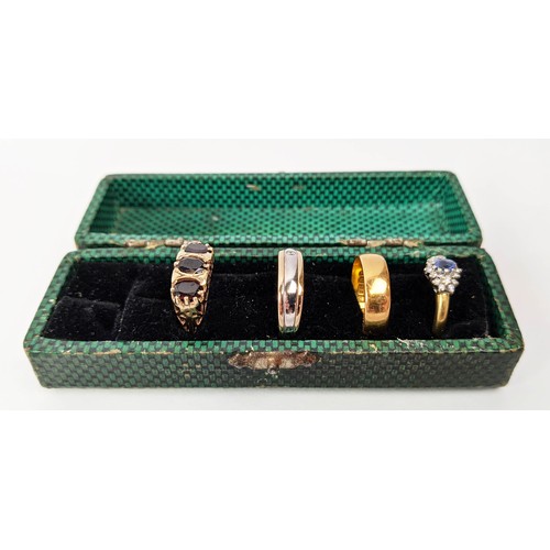 77 - FOUR VARIOUS DRESS RINGS, comprising a 22ct gold wedding band, ring size Q½, 4.64 grams; a 9ct gold ... 