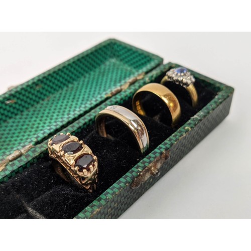77 - FOUR VARIOUS DRESS RINGS, comprising a 22ct gold wedding band, ring size Q½, 4.64 grams; a 9ct gold ... 