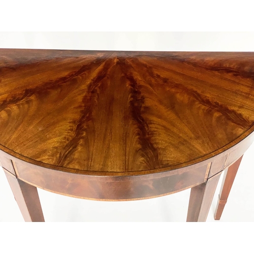 644 - HALL TABLE, George III style flame mahogany and crossbanded semi circular with radial veneered top, ... 