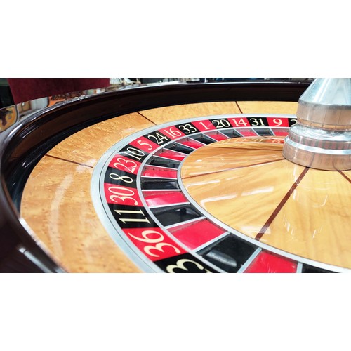 611 - ROULETTE WHEEL, made by Technical Casino supplies with birds eye maple and satinwood, lacquered fini... 