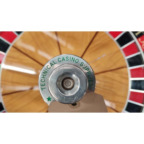 611 - ROULETTE WHEEL, made by Technical Casino supplies with birds eye maple and satinwood, lacquered fini... 