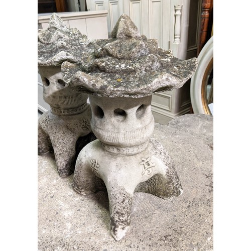 157 - GARDEN TABLE, 57cm H x 77cm D, naturalistic design, reconstituted stone with four stools, 42cm H and... 