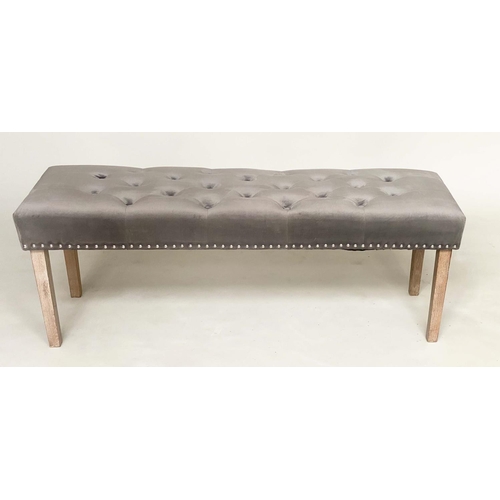 279 - WINDOW SEAT, rectangular deep buttoned velvet upholstered and brass studded, with tapering limed oak... 