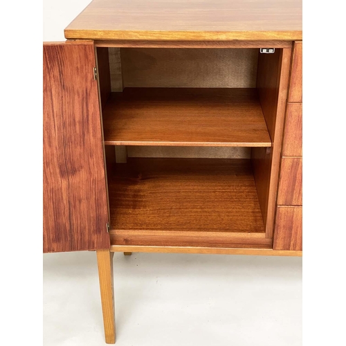 281 - GORDON RUSSELL SIDEBOARD, 1970s Indian Laurel with four centre drawers flanked by doors enclosing sh... 