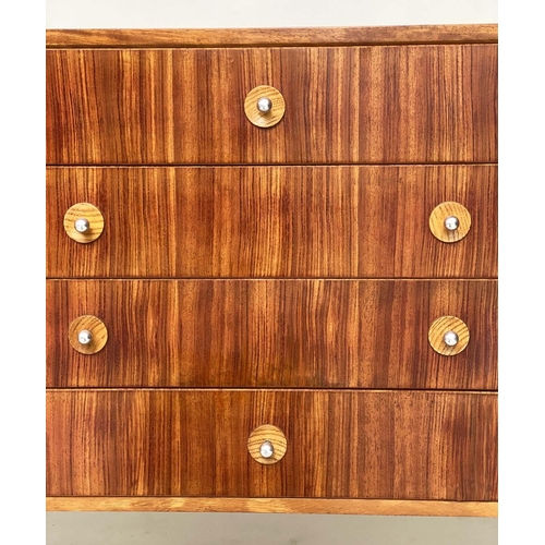 281 - GORDON RUSSELL SIDEBOARD, 1970s Indian Laurel with four centre drawers flanked by doors enclosing sh... 