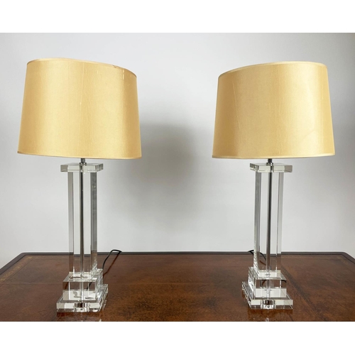 500 - TABLE LAMPS, a pair, clear glass columns with gold shades. (2)