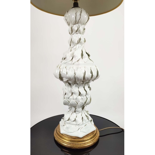 179 - WHITE PORCELAIN SIDE LAMP, in a leaf design on a gilt base, 80cm H overall including shade.