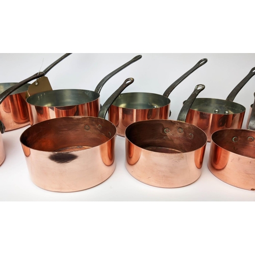 109 - BATTERIE DE CUISINE, set of eleven graduated copper pans, largest 17.5cm diam. (11)