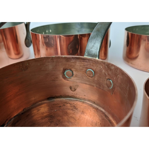 109 - BATTERIE DE CUISINE, set of eleven graduated copper pans, largest 17.5cm diam. (11)