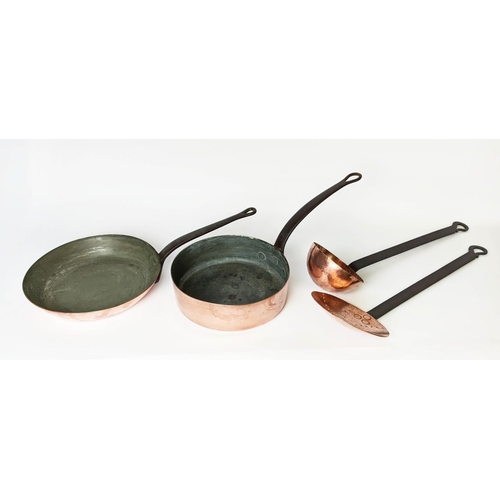 387 - BATTERIE DE CUISINE, comprising of a graduated set of five copper pans, the largest 31cm diam and tw... 