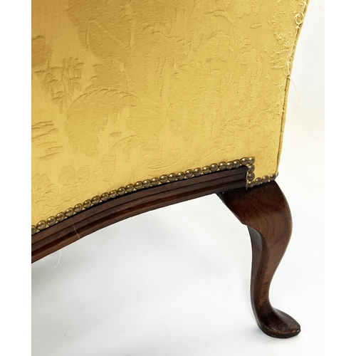 107 - WING ARMCHAIR, 112cm H x 98cm W, Queen Anne style, walnut, in yellow fabric.