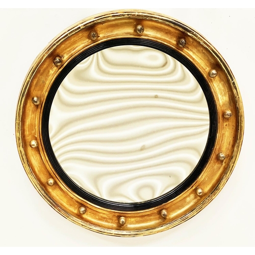 121 - CONCAVE WALL MIRROR, 19th century circular giltwood and ball encrusted with slightly concave mirror ... 