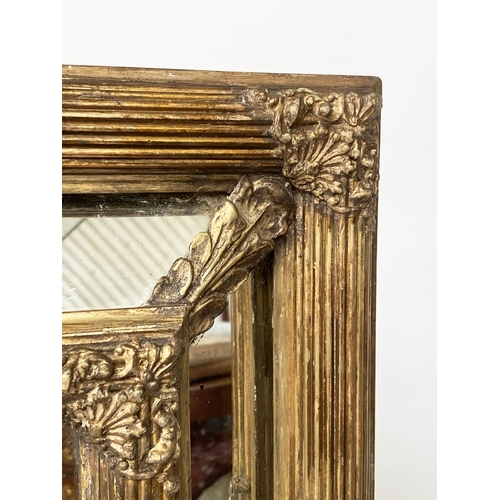 136 - WALL MIRROR, late 19th century French giltwood and gesso with reeded and floral cushion frame, aroun... 