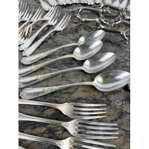 15 - QUANTITY OF FRENCH SILVER PLATED FLATWARE, including a Christofle ladle, animal knife rests and vari... 